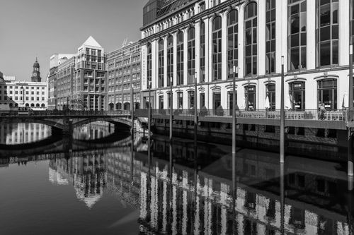 Free Black and white photo of buildings and canal reflection in Hamburg, Germany. Stock Photo