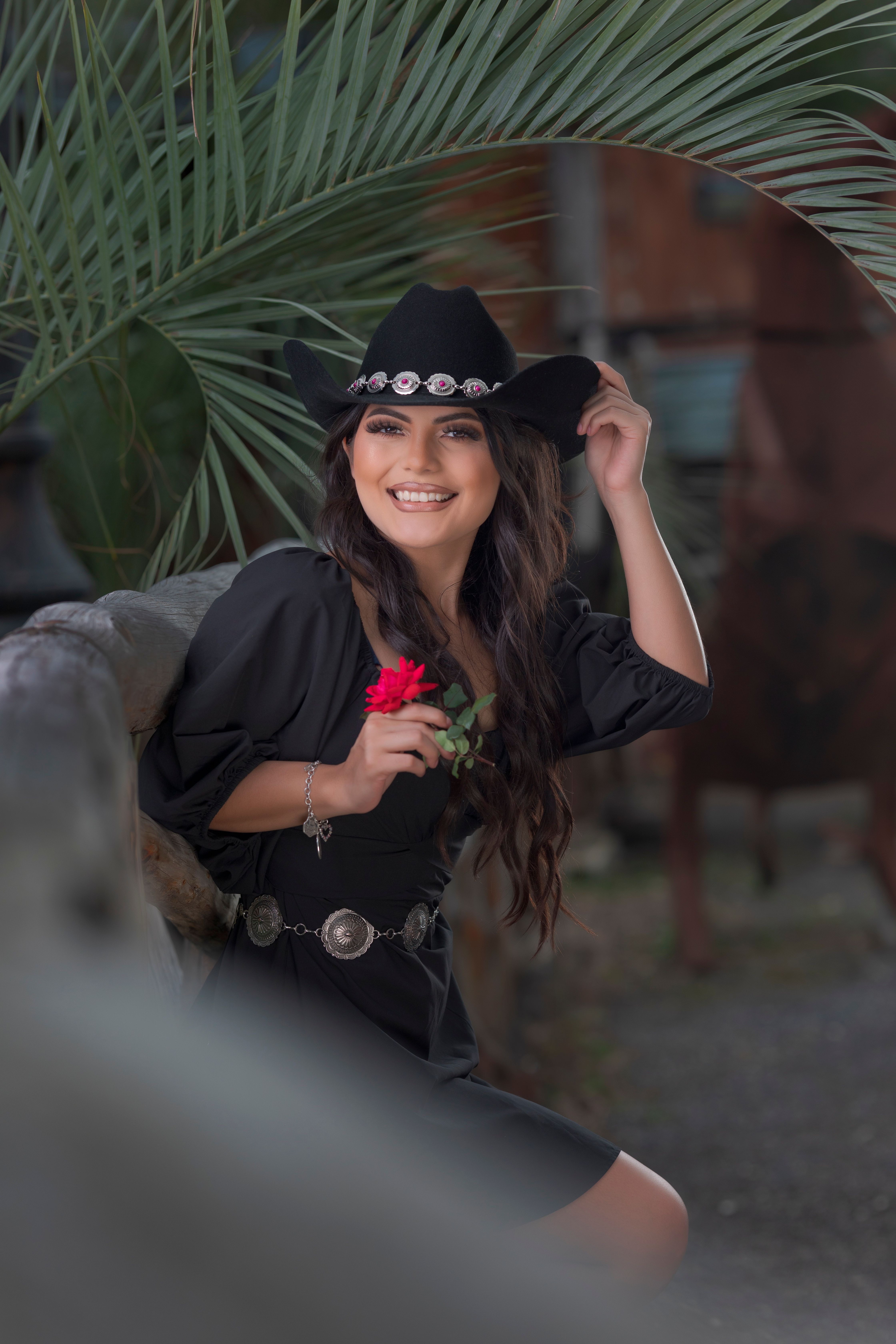 Smiling Brunette Woman in Hat and Black Dress · Free Stock Photo