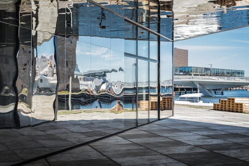 Copenhagen harbour through a mirrored pathway