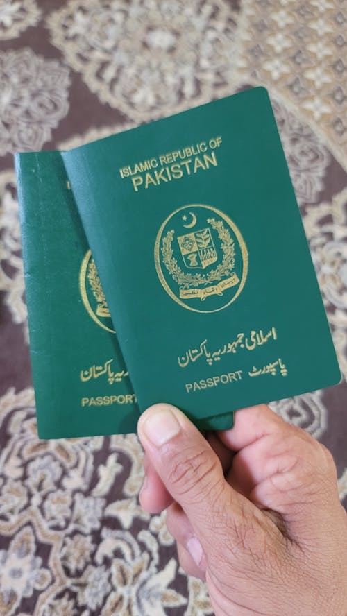 Free stock photo of green passport, pakistan passport, pakistani passport