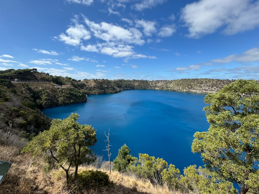 Stunning view of the Blue Lake surrounded by lush greenery in Mount Gambier, South Australia.