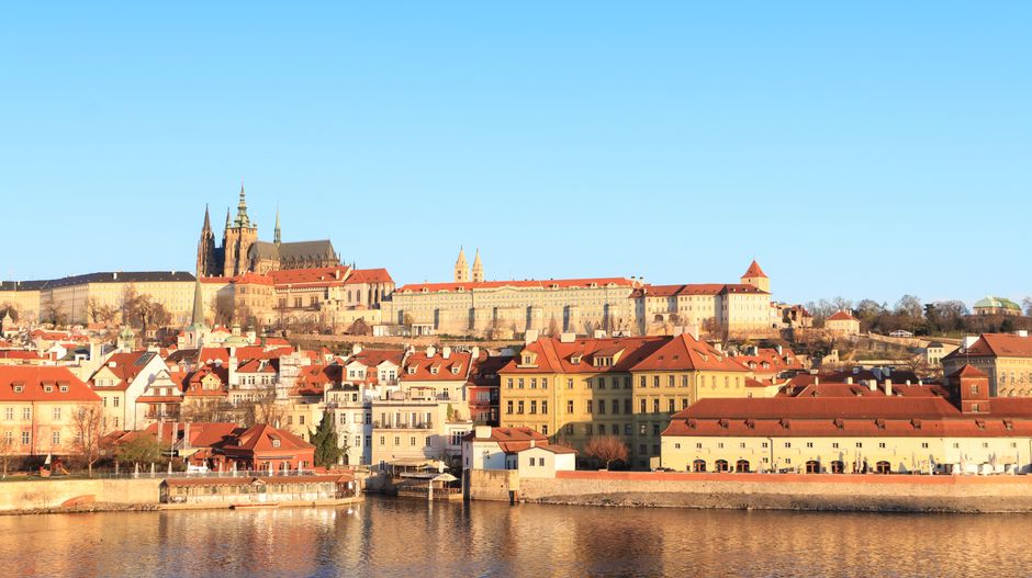 Tourists admiring Prague Castle from outside