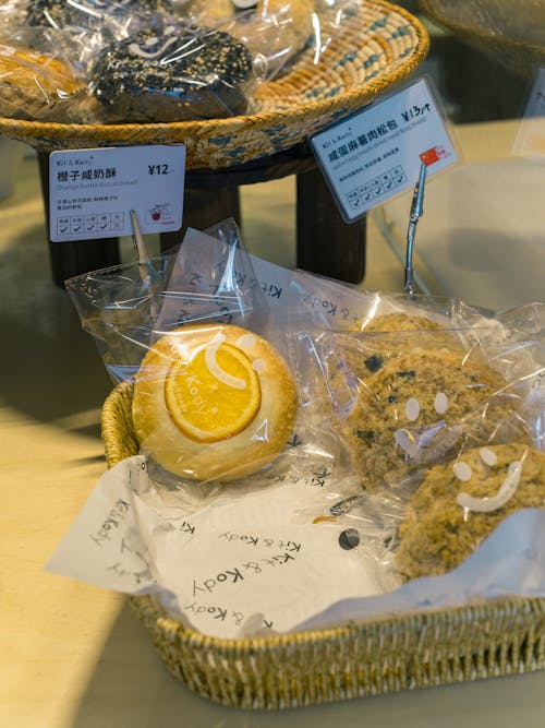 A basket filled with cookies and other items