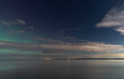The aurora bore is seen over the water