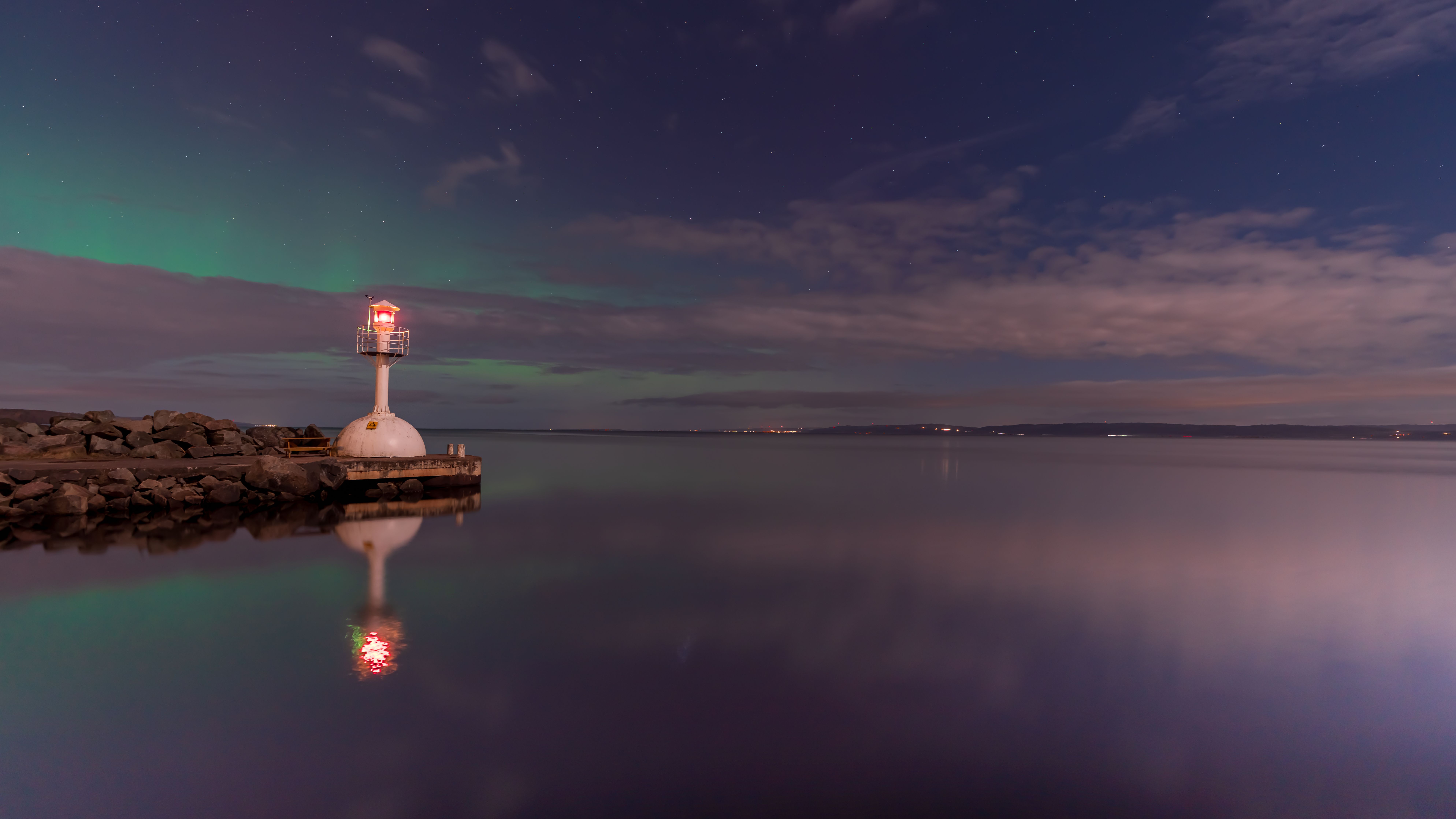lighthouse keeper night coastline