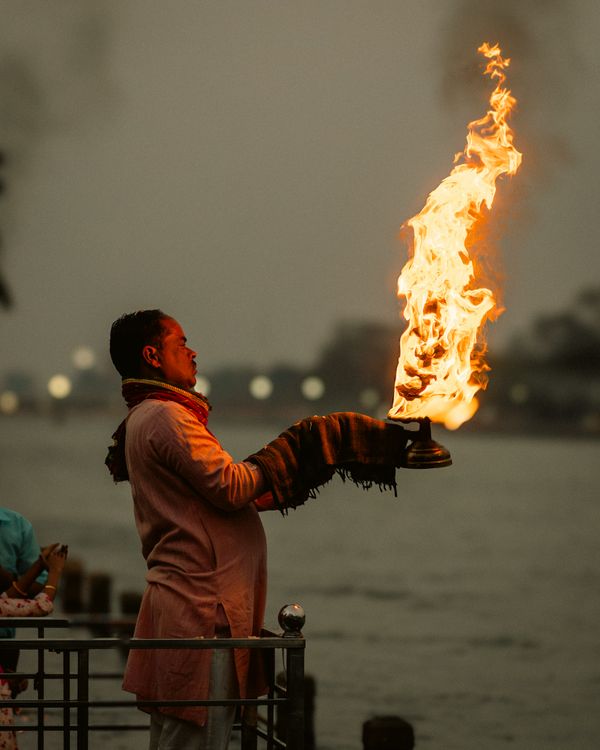 Man Holding Burning Pot in Ritual · Free Stock Photo