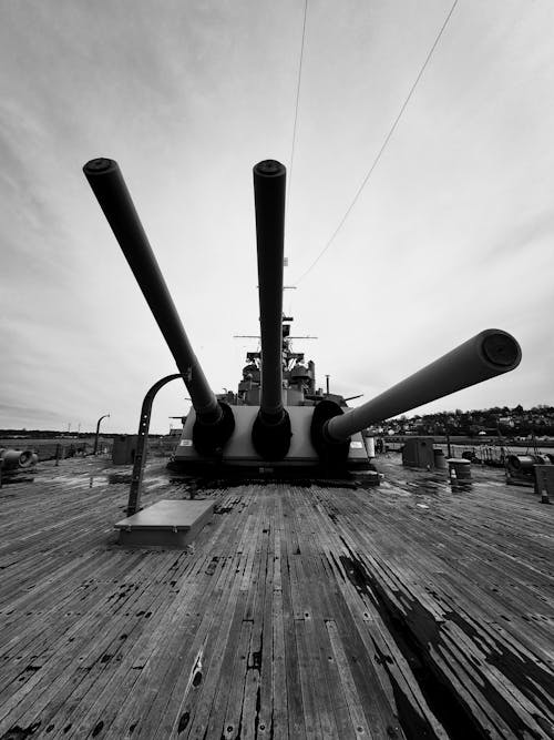 A black and white photo of a battleship