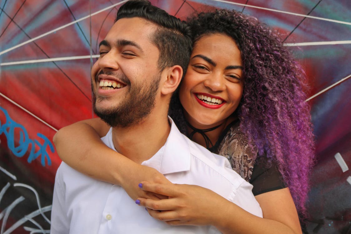 Woman Hugging Man from His Back