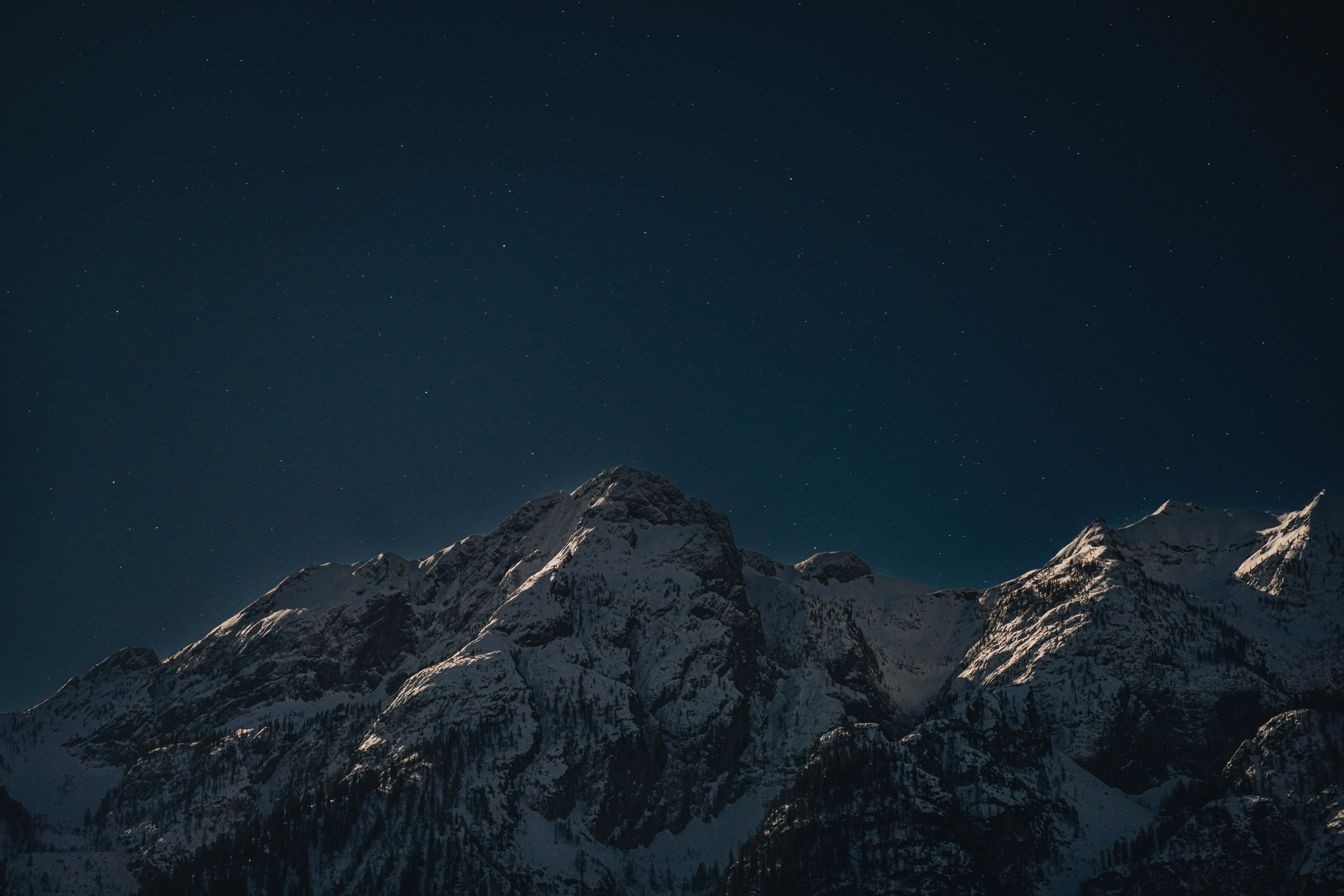 Night Sky over Snowy Rocky Mountain · Free Stock Photo