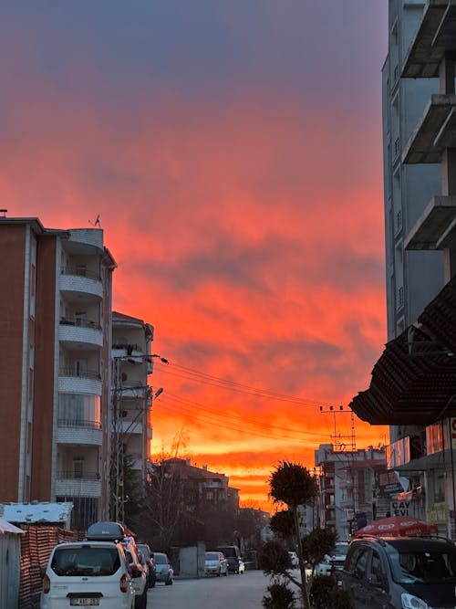 Red Sky over City Street at Sunset