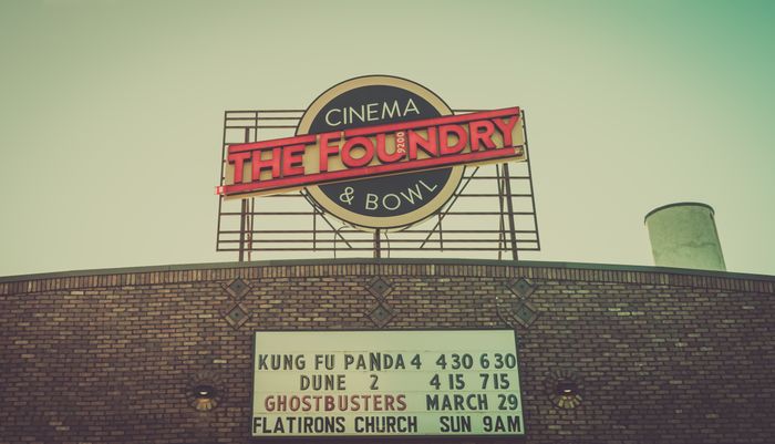 A cinema marquee sign listing the week ahead, photo by Chris F on Pexels