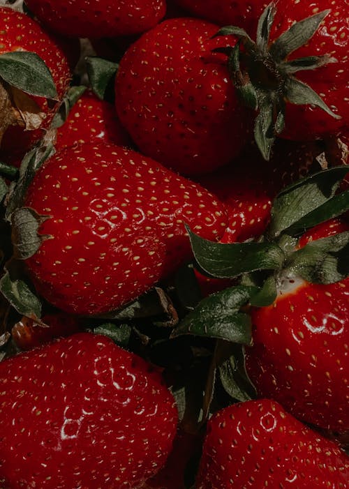 A close up of a bunch of strawberries