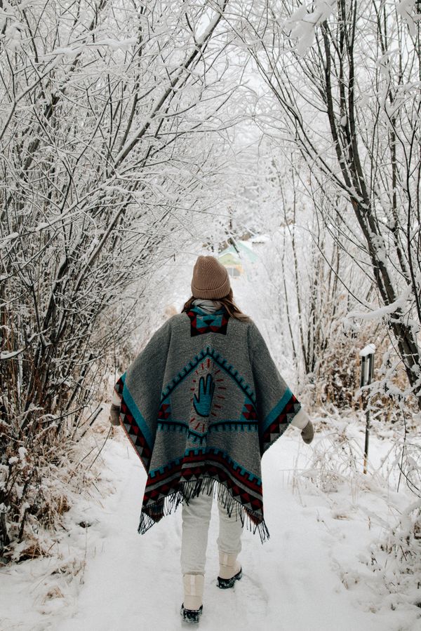 Woman in cozy winter wrap