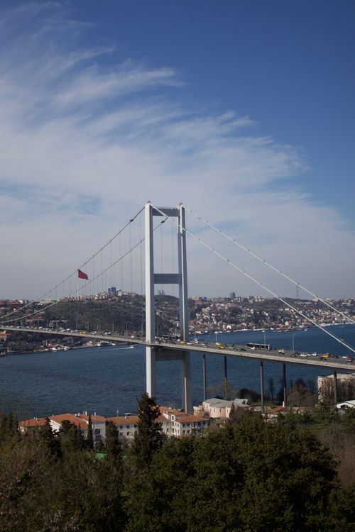 Free View of the Bosphorus Bridge spanning the Bosphorus Strait with Istanbul skyline backdrop. Stock Photo