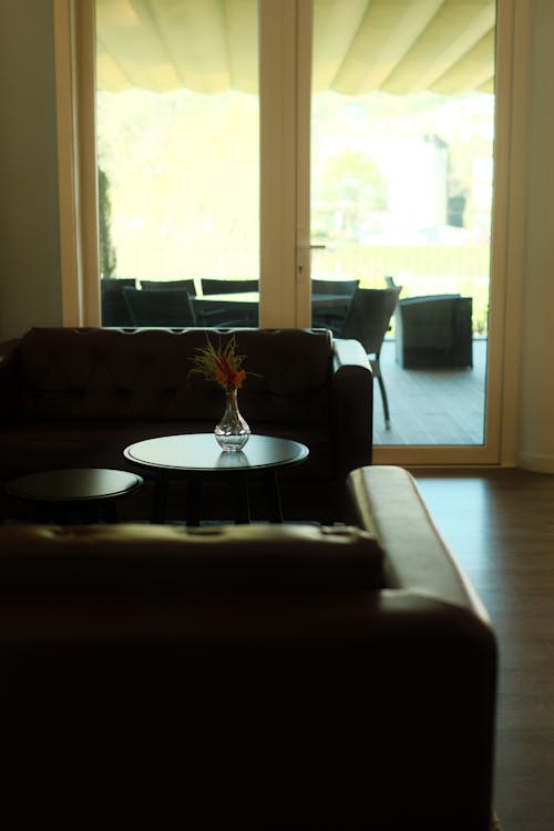 A living room with a couch and a table