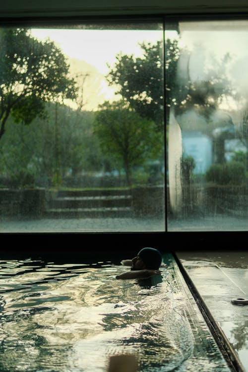 Man Lying Down at Pool