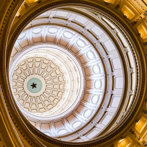 White and Yellow Dome Building Interior