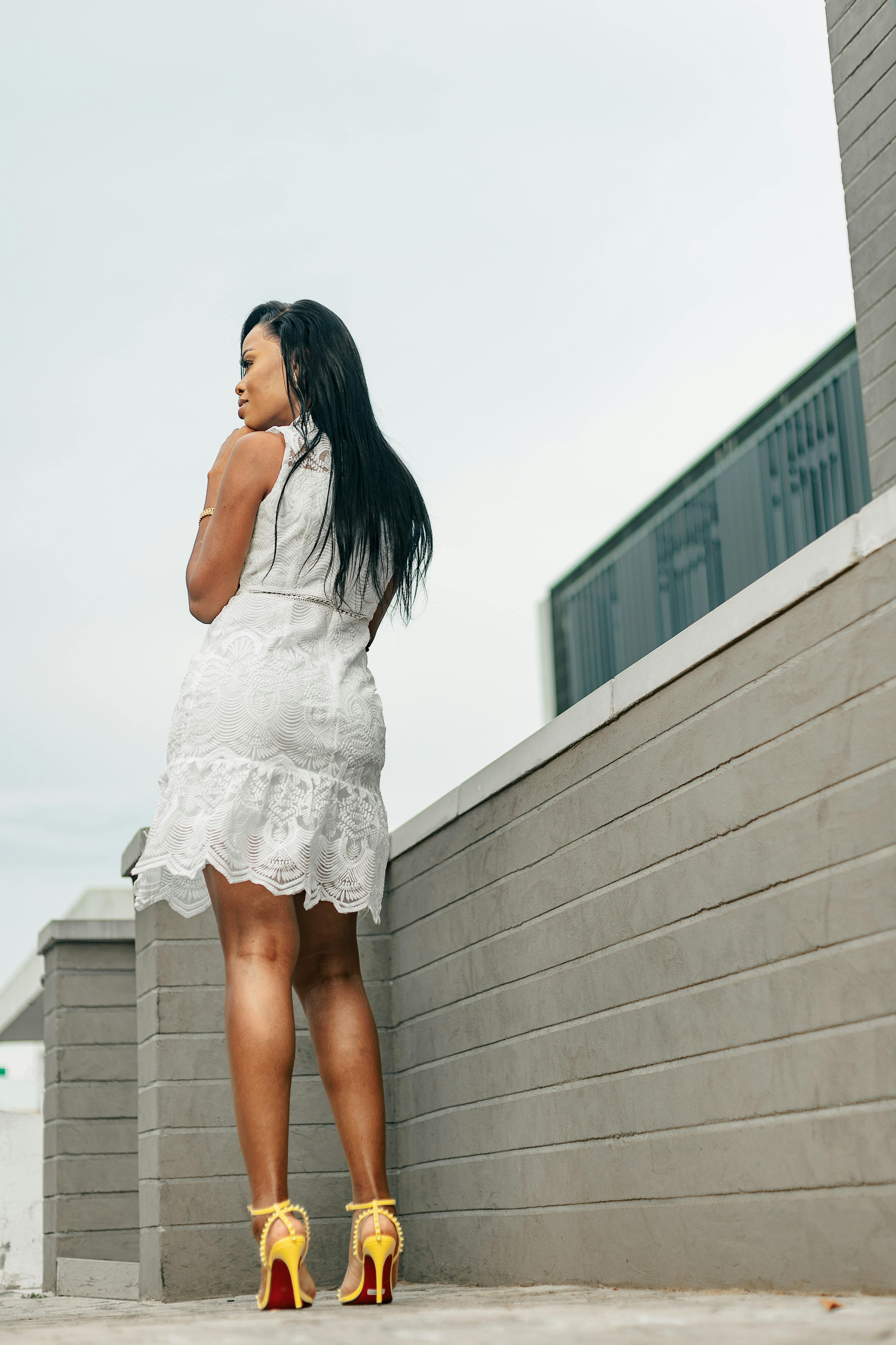 Back View Of Woman In White Dress And High Heels · Free Stock Photo