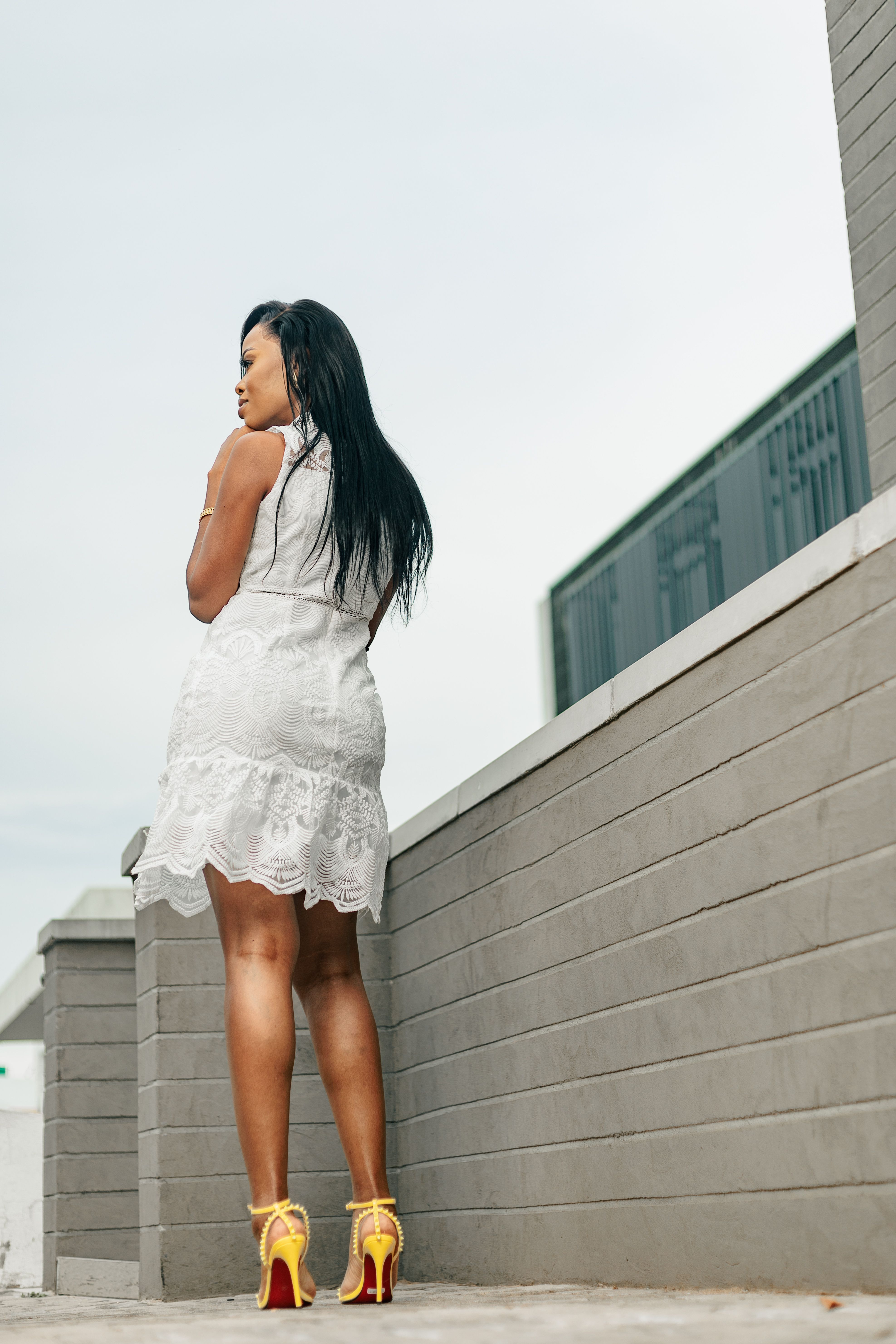 Back View of Woman in White Dress and High Heels  Free Stock Photo