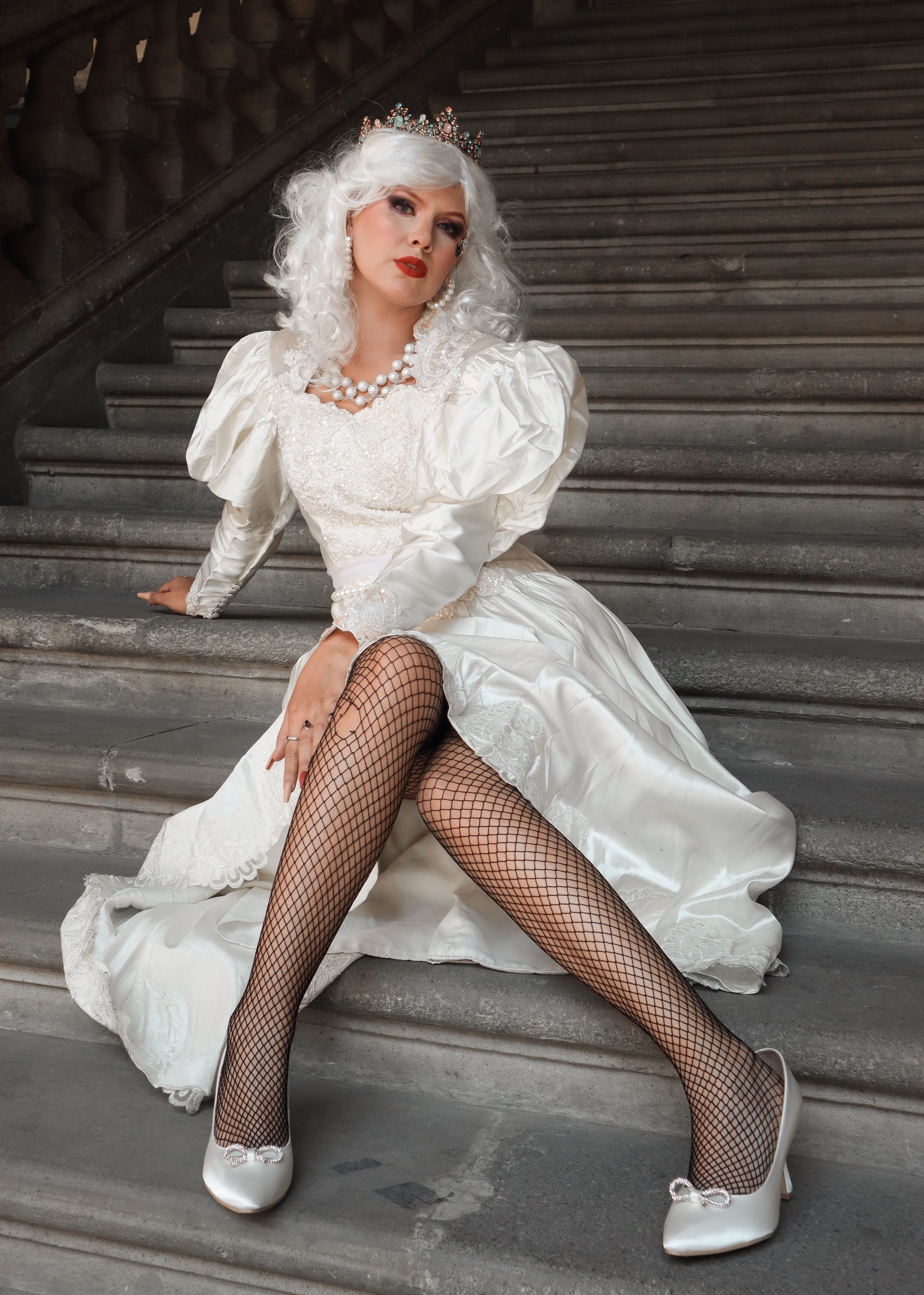 Woman in White Dress and in Crown Sitting on Stairs · Free Stock Photo