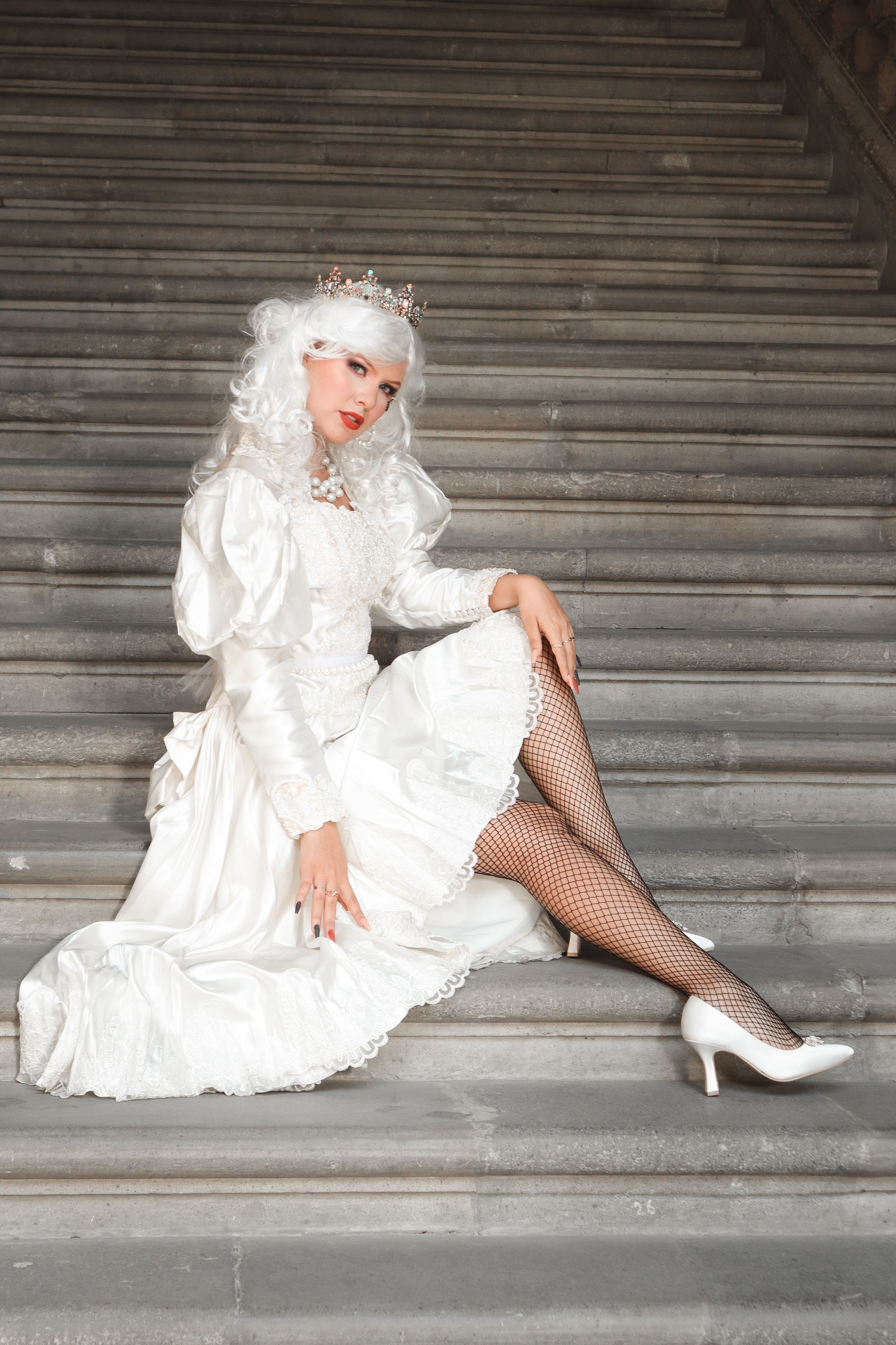 Woman in White Dress Sitting on Stairs · Free Stock Photo