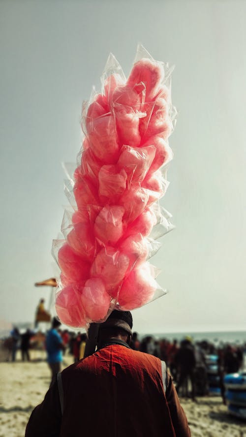 Vendor with Cotton Candy on Beach