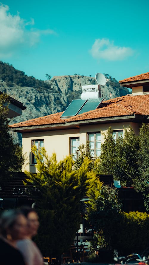 A house with a solar panel on the roof