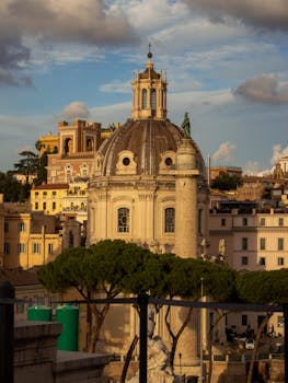 A beautiful view of Rome's iconic baroque architecture at sunset, showcasing intricate details.