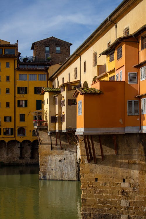 Colorful buildings on the river bank in florence