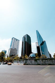 Skyline view showcasing modern skyscrapers in Mexico City under a clear blue sky.