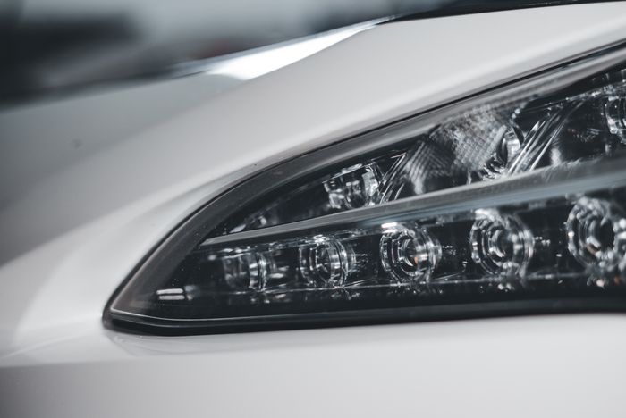 After — clear, restored headlight lens