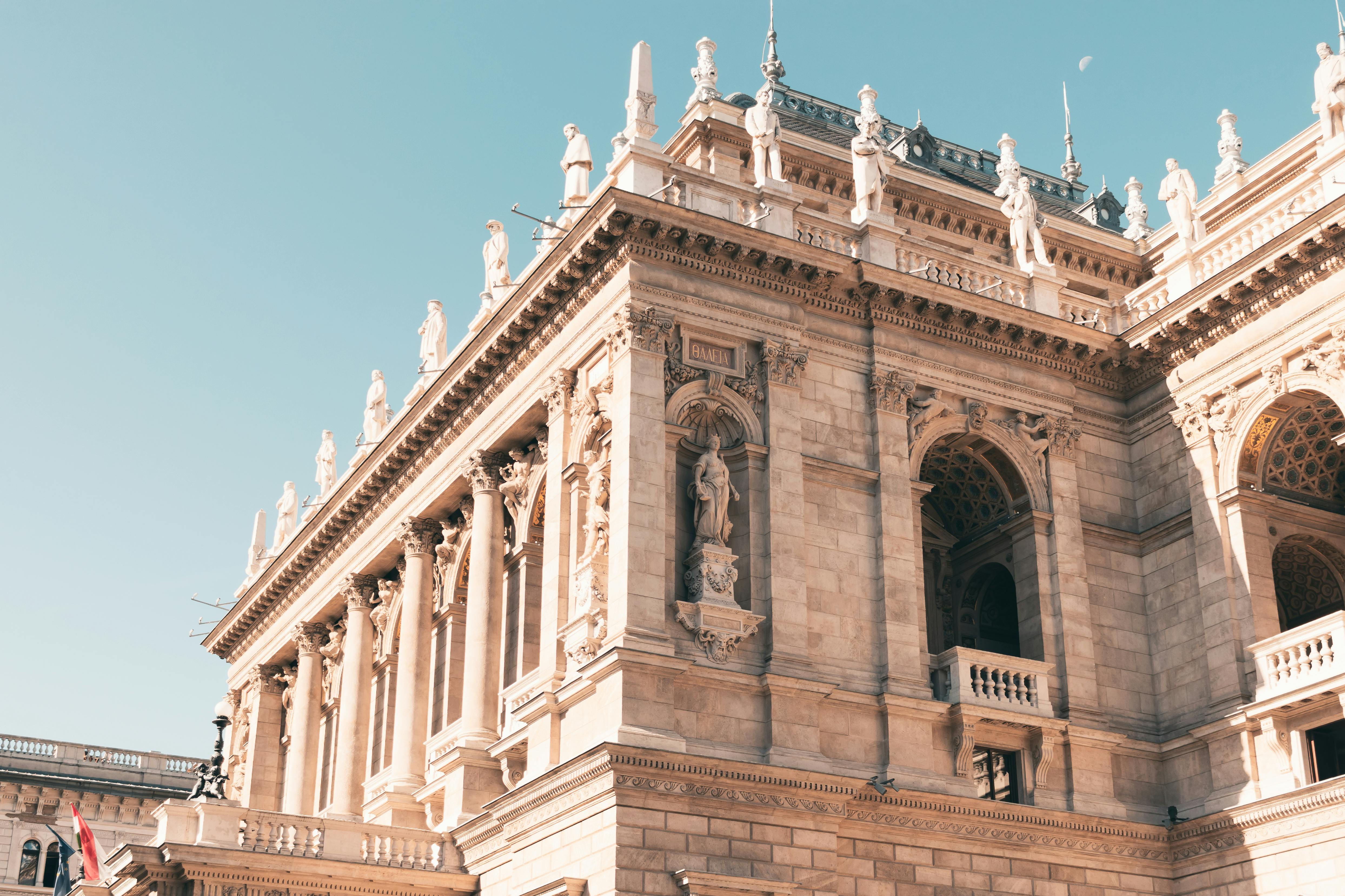 Classic Renaissance architecture of the Hungarian State Opera House on a sunny day in Budapest.