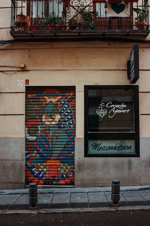 A colorful door with a mural on it