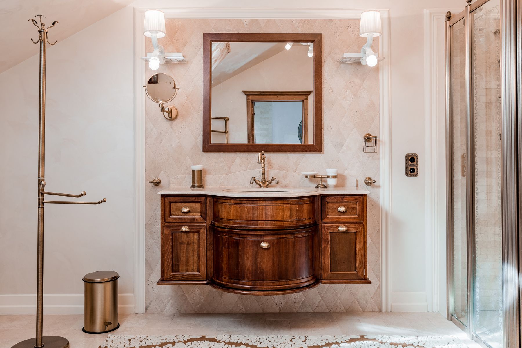 Updated traditional bathroom with wood vanity, mirror and polished contemporary-classic details