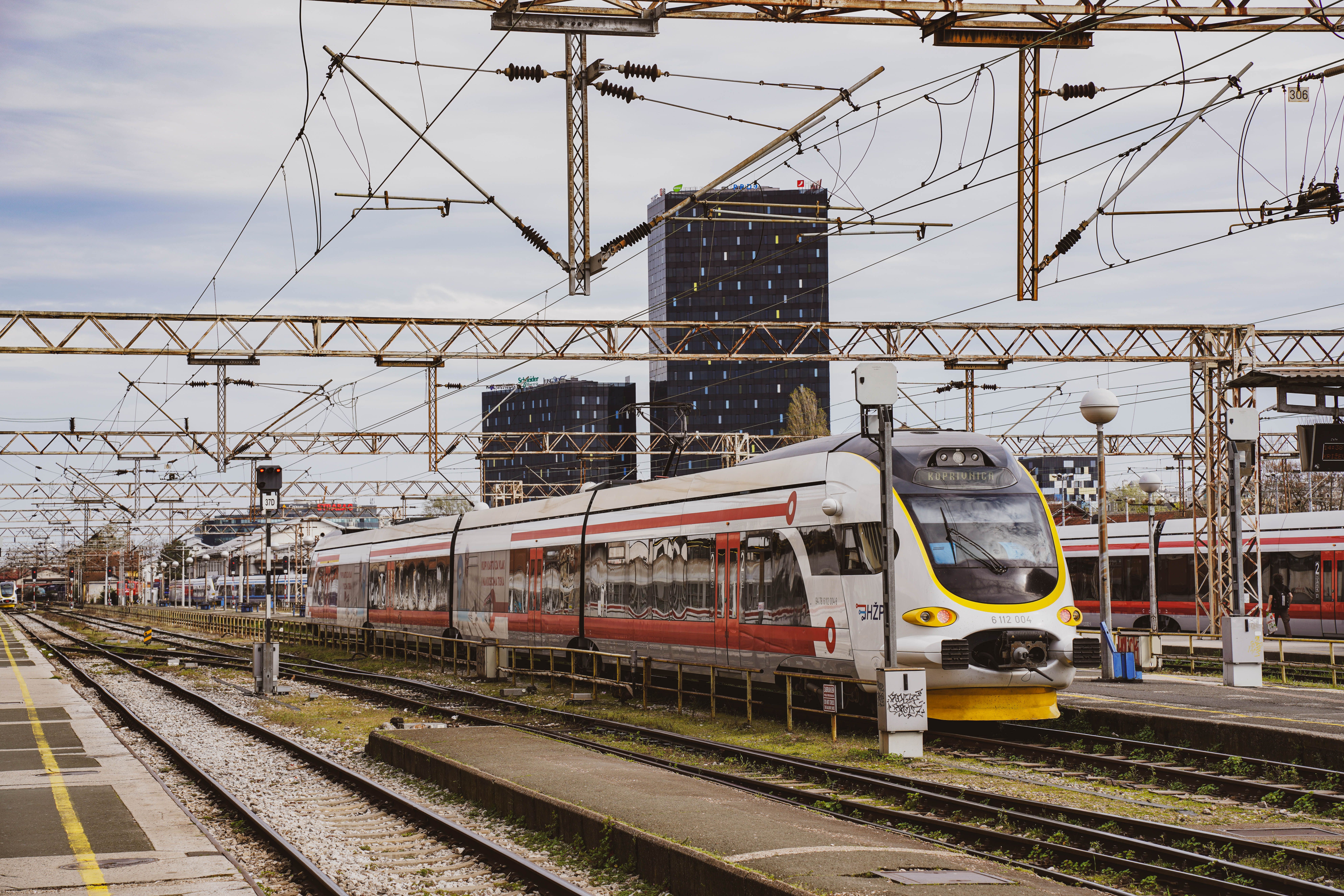 Passenger Train Arrives to the Station · Free Stock Photo
