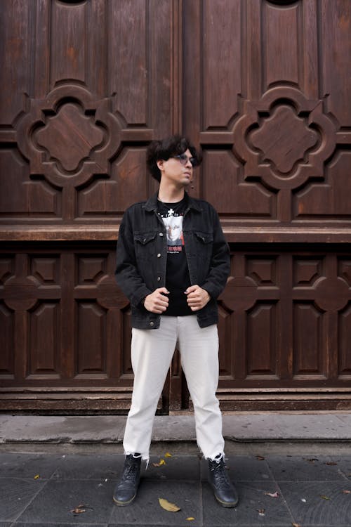 Man in Eyeglasses and Black, Jean Jacket