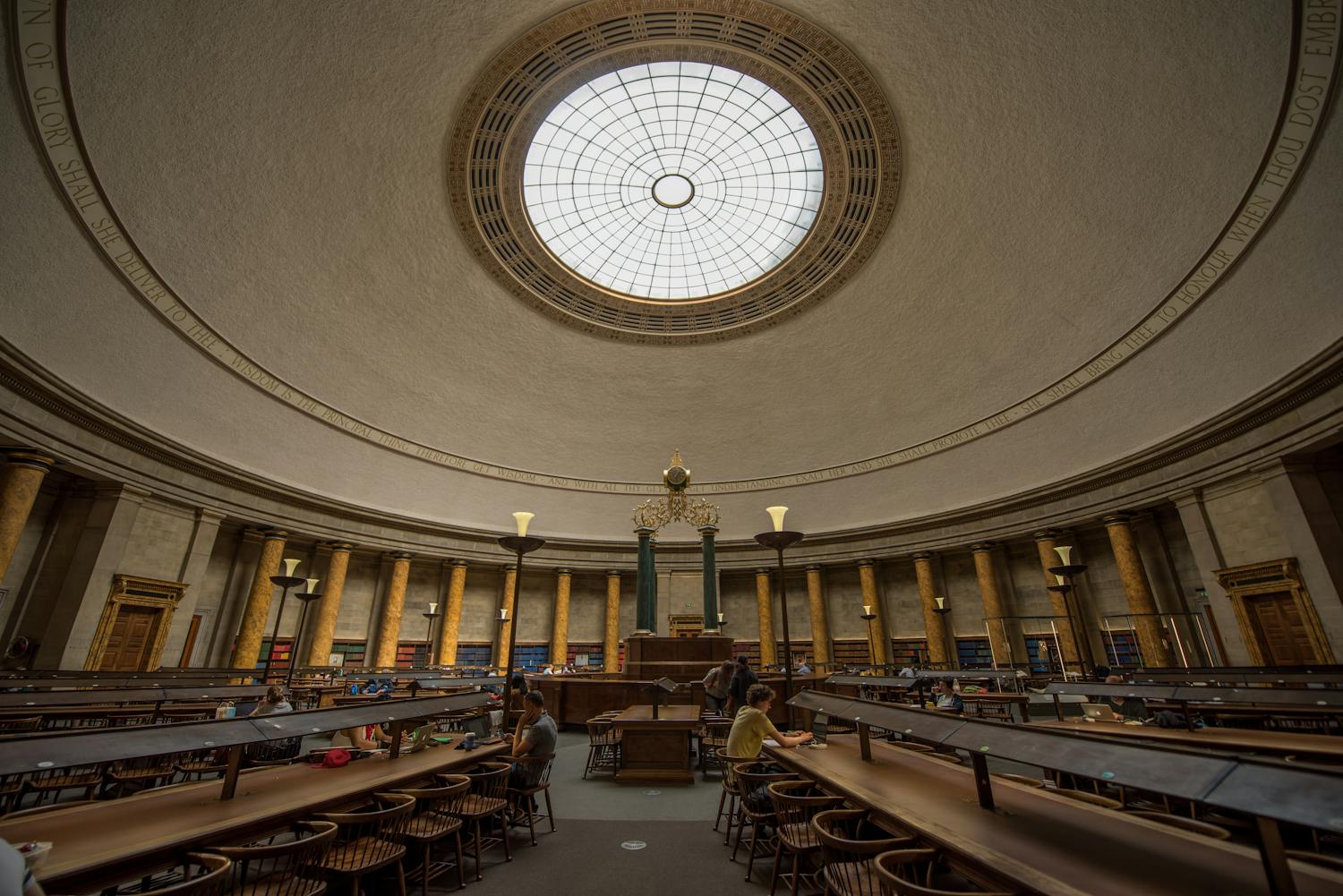 Elegant interior of a historic Cambridge library with grand dome ceiling