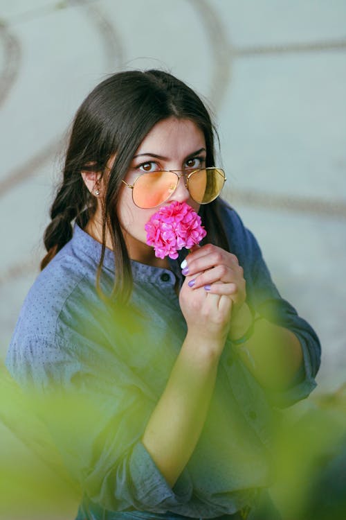 Free Woman Smelling Flowers Stock Photo
