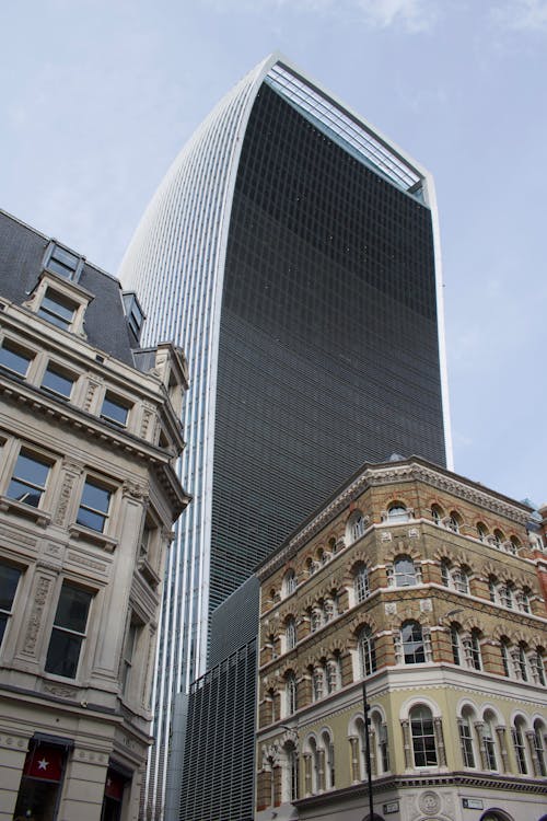 A tall building with a large glass front
