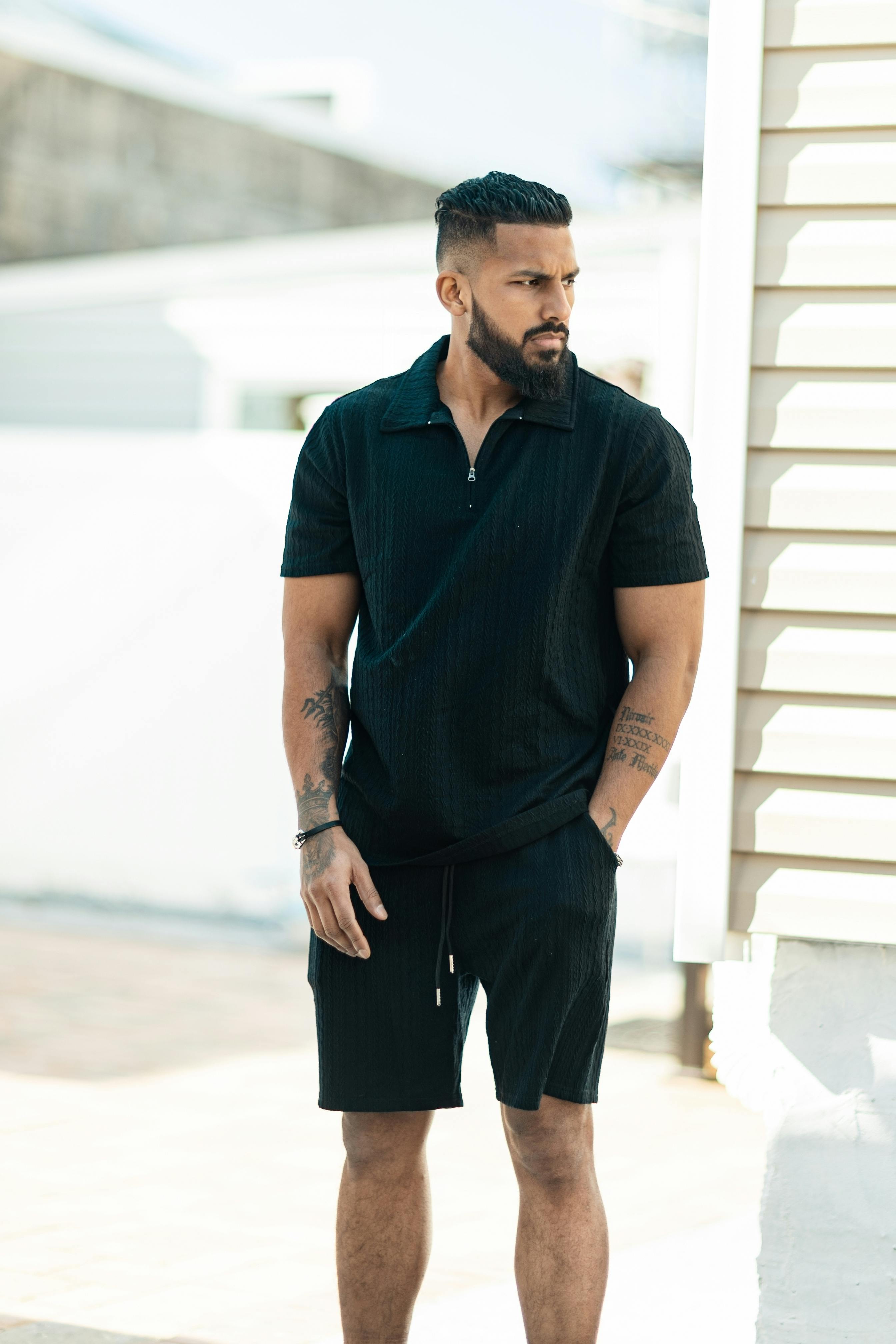 Man in Black Polo Shirt and Shorts Free Stock Photo