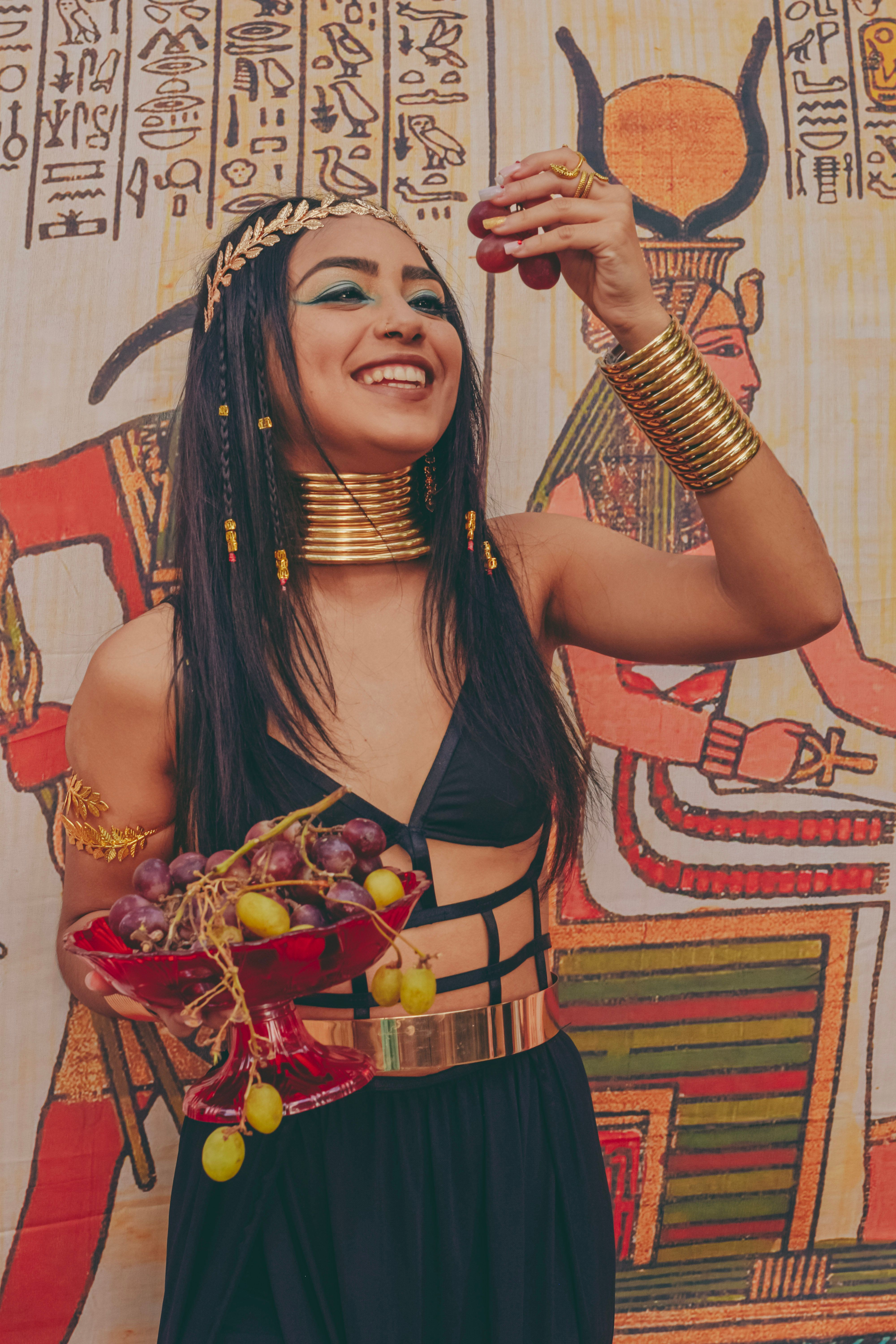 Model in Black Dress and Gold Jewelry  Free Stock Photo