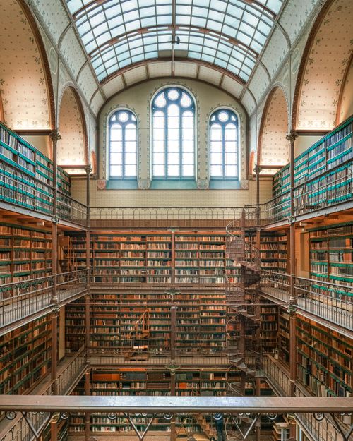 Free Explore the breathtaking interior of the Rijksmuseum Library in Amsterdam, filled with endless books and architectural beauty. Stock Photo