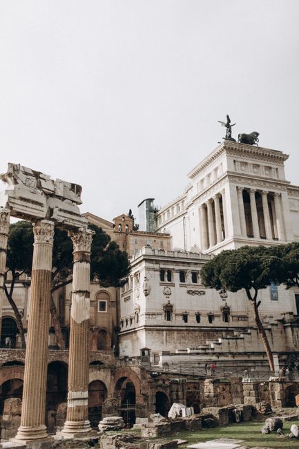 Historic view of the ancient Roman Forum with famous landmarks in Rome, Italy.