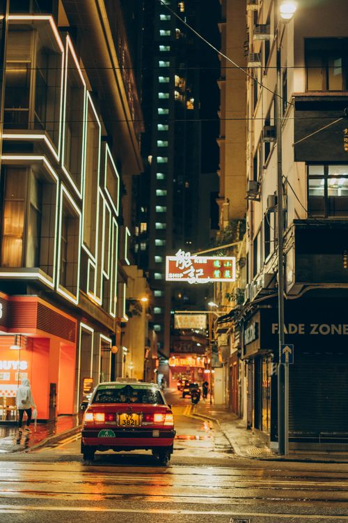 Free Explore Hong Kong's dazzling cityscape with neon lights and bustling streets captured at night. Stock Photo