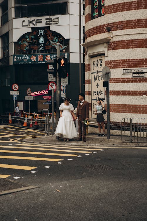Wedding Couple on a Pedestrian Crossing 