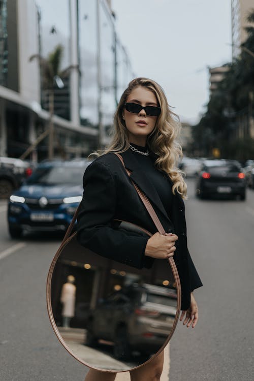 Blonde Woman with Mirror on Street