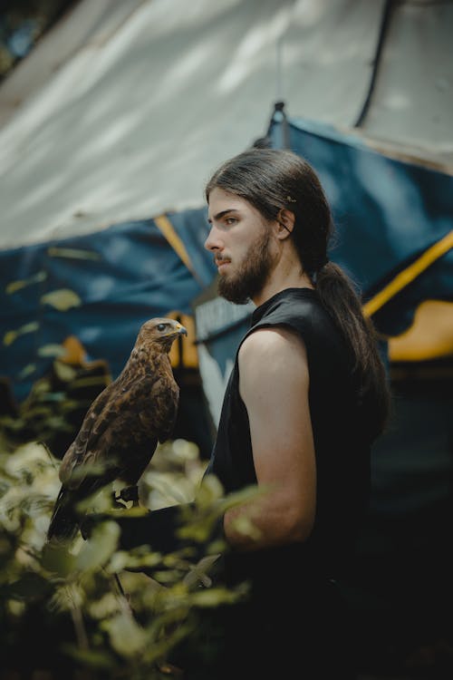 Man Standing with Hawk