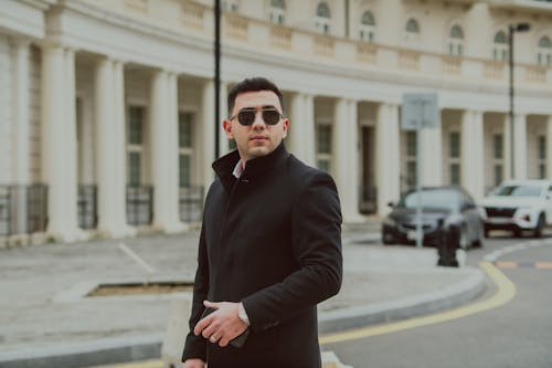 Man in Sunglasses and Black Coat