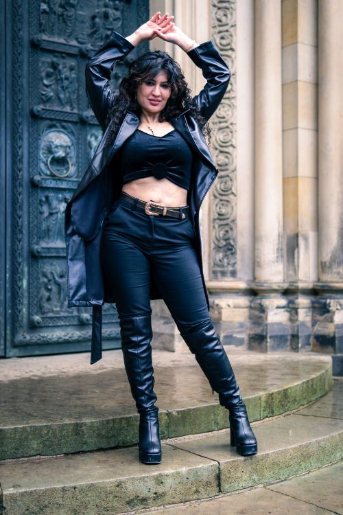 Free Stylish woman in black leather posing confidently outdoors, exuding modern fashion vibes. Stock Photo