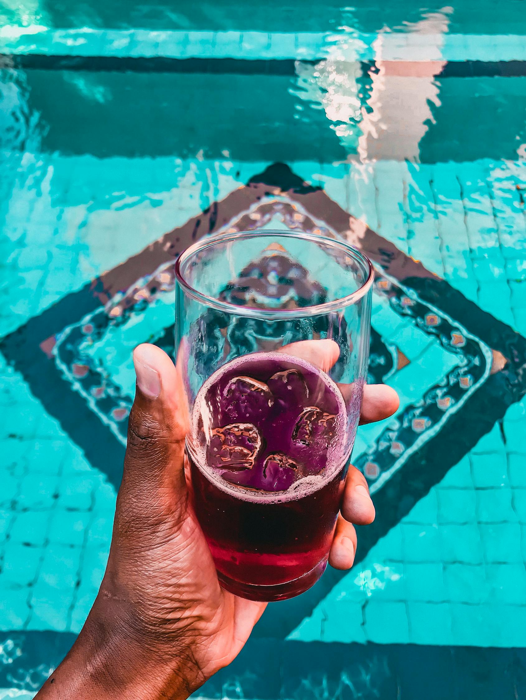 Red wine by the pool with Ice Cubes.